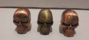 lot 65 image: 3 Vintage skull cigarette snuffers