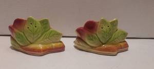 lot 74 image: 2 vintage ceramic salt and pepper shakers.  no caps
