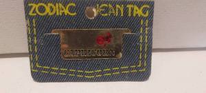 lot 100 image: Zodiac Capricorn jean tag
