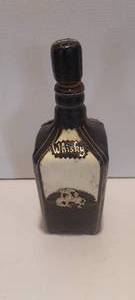 lot 132 image: Leather and cowhide bound whiskey bottle (EMPTY)