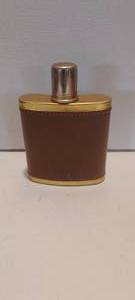 lot 135 image: Leather and brass whiskey flask (EMPTY)