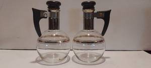 lot 163 image: MC Inland Glass single serving Carafettes 6 tall.  Could also be used as oilvineger