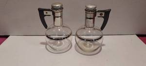lot 164 image: MC Inland Glass single serving Carafettes 6 tall.  Could also be used as oilvineger