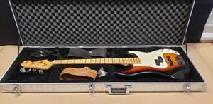 lot 18 image: Absolutely Beautiful & Highly Collectible Fender 1992 Tobacco Sunburst Electric Bass Guitar, Made in Corona, CA USA w Straps, Hard Case & Keys