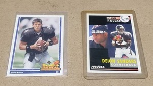 lot 112 image: 1991 Upper Deck Rookie Force Brett Favre Rookie Card & Deion Sanders 1991 Score Pinnacle #147