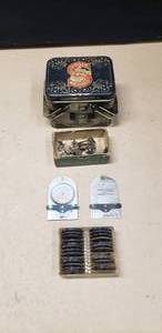 lot 466 image: Singer Sewing Tin w Sewing Attachments.  Cam Fashion Discs & More