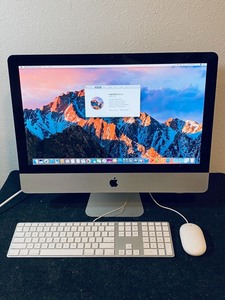 lot 27 image: Apple iMac 21.5 Mid 2010 MC508LLA 8GB 500GB Intel Core i3 3.06GHz in Silver Grade A