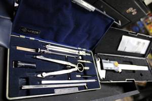 lot 73 image: Caliper and compasses