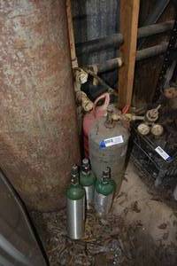 lot 63 image: Oxygen Tanks, Helium Tank, and Acetylene Tank