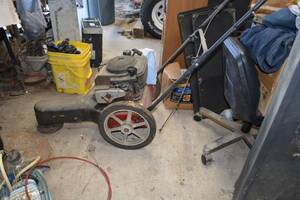 lot 5 image: Swisher walk behind Brush Mower