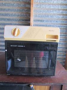 lot 19 image: Sharp carousel microwave half pint used, unknown working order