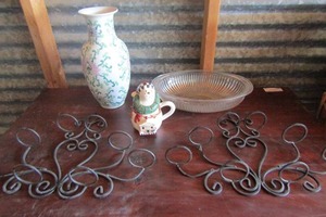 lot 23 image: Debbie Mumm covered snow man cup, clear glass bowl, 9 slot votive candle holders cast iron that hangs on wall