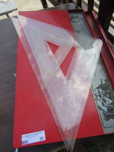 lot 36 image: Rick Mears red tool traycase & various clear level sqaures