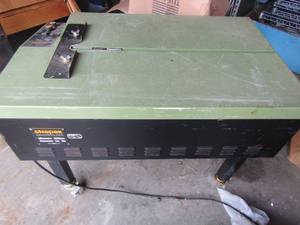 lot 1 image: Strapex Binding strapping machine  Swedish, rolls and has electric plug