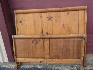 lot 54 image: Solid wood queen size  head and foot board with star dcor