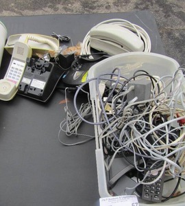 lot 57 image: Misc. lot of house hold phones and cords. Some wireless and some have caller id