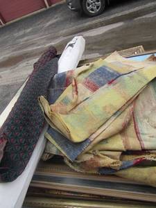 lot 58 image: lot of multi color fabric plus to partially used fabric rolls