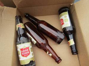 lot 62 image: 4 Vintage Lone start empty beer bottles