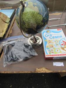 lot 67 image: Ora ceasul kids game NIB, Small world globe on stand in ment condition