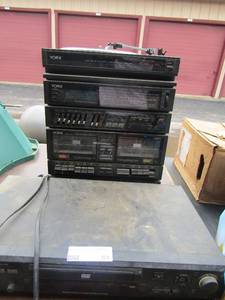 lot 69 image: Yorx turn table cassette tape playing radio no speakers unknown working order, Mintek DVD player, unknown working order