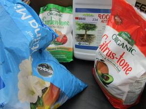 lot 70 image: Garden feed lot, Root stimulator new, Organic citrus tone Avocado food New, used bag of miracle grow
