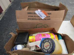 lot 127 image: Lot of used bathroom items such as soaps, meds, body oils, shampoo, and more