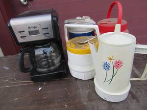 lot 140 image: Mr. Coffee coffee pot, tea kettle with no power cord, 3 igloo drink coolers different sizes