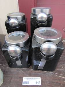 lot 141 image: 4 black canisters all come with spoons in good condition