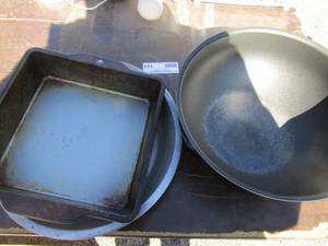 lot 144 image: Metal mixing bowl, metal cornbread pan, pie pan
