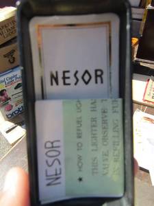 lot 153 image: Neser Butane lighter, comes in own case with original paperwork