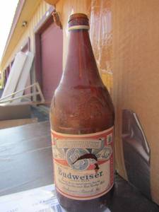 lot 166 image: Lot of beer bottles includes, Budweiser, old Milwaukee, rolling rock, miller light, bud light