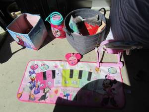 lot 200 image: Toy lot Minnie mouse piano music step board, New Minnie mouse sand play set, stroller,