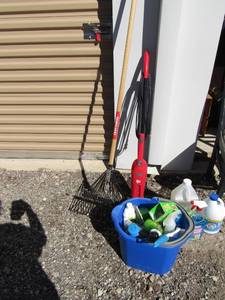 lot 213 image: mop bucket, used cleaning supplies, outdoor rake, and more