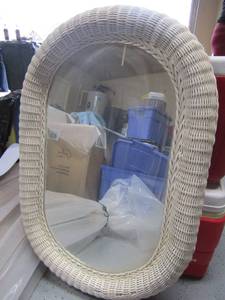lot 67 image: White wicker framed wall mirror, oval design  37 X 23