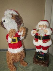 lot 73 image: Musical singing  Santa 22 tall, light up Santa doggy works 27 tall