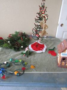 lot 81 image: 23 dcor Christmas tree, Christmas village house, greenery dcor, single small strand of colored lights