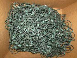 lot 82 image: Box of strand green lights for house or outside decoration