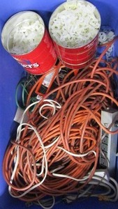 lot 86 image: Christmas light hooks clamps, various extension cords, extended light plugs, twin size air mattress, duffle bag used
