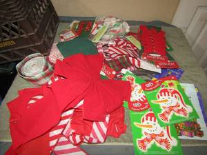 lot 88 image: Lot of ribbon and bows, name tags, bells and more dcor