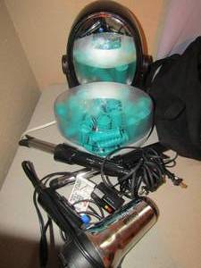 lot 59 image: Conair blow dryer, various curling irons, make up mirror, Remington hair curlers, and holders