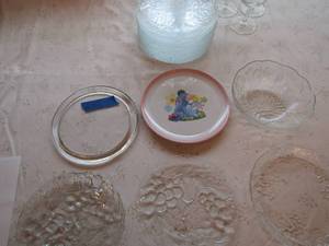 lot 39 image: 17 clear glass saucers, 7 short wine stim glasses, 2 kids plates and more