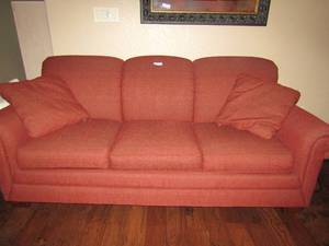 lot 119 image: Lazy boy sofa very nice like new seats 3 barley used, comes with 2 matching throw pillows