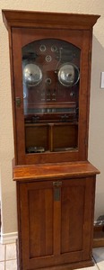 lot 18 image: ANTIQUE BANK ALARM - INCLES PAPERS  & 1920S INSPECTIONS ,  CABINET AT BASE   VERY NICE   RETAILS $3500