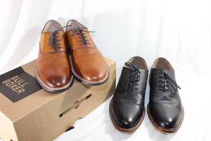 lot 21 image: (2) Ashton Grey mens dress shoes. Cordovan and Black. Both size 10.5 (One is Unused)