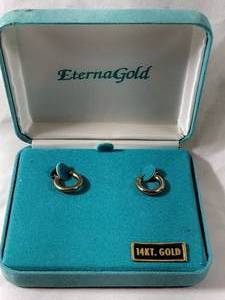 lot 31 image: Jewelry 14K yellow gold Eterna Gold hoop earrings. Marked 14K EG(Eterna Gold). Boxed