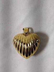 lot 39 image: Jewelry 14K yellow gold puffed heart pendant. Marked 14K Italy. Approx 1.5L