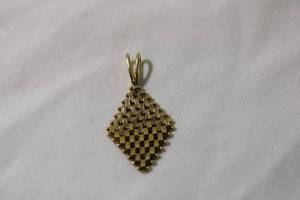 lot 52 image: Jewelry 14K yellow gold diamond mesh pendant w fixed bale. Marked 14K. Approx 1L (Similar to Lot 25 but not identical)
