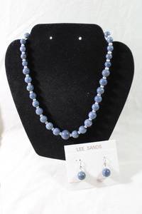 lot 100 image: Jewelry Sterling Silver signed Lee Sands Sodalite and button Pearl spacer necklace and matching earring demi parure set. Marked 925. In box with pamphlet. Necklace 18L and French ear wire earrings.