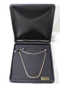 lot 57 image: Jewelry 14K yellow gold rope chain necklace. Marked 14. Tube clasp w safety clasp. Has presentation box.