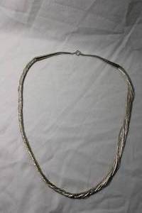 lot 79 image: Jewelry Sterling Silver Heishi liquid silver bead multi strand (20) necklace. Marked 925. 20L